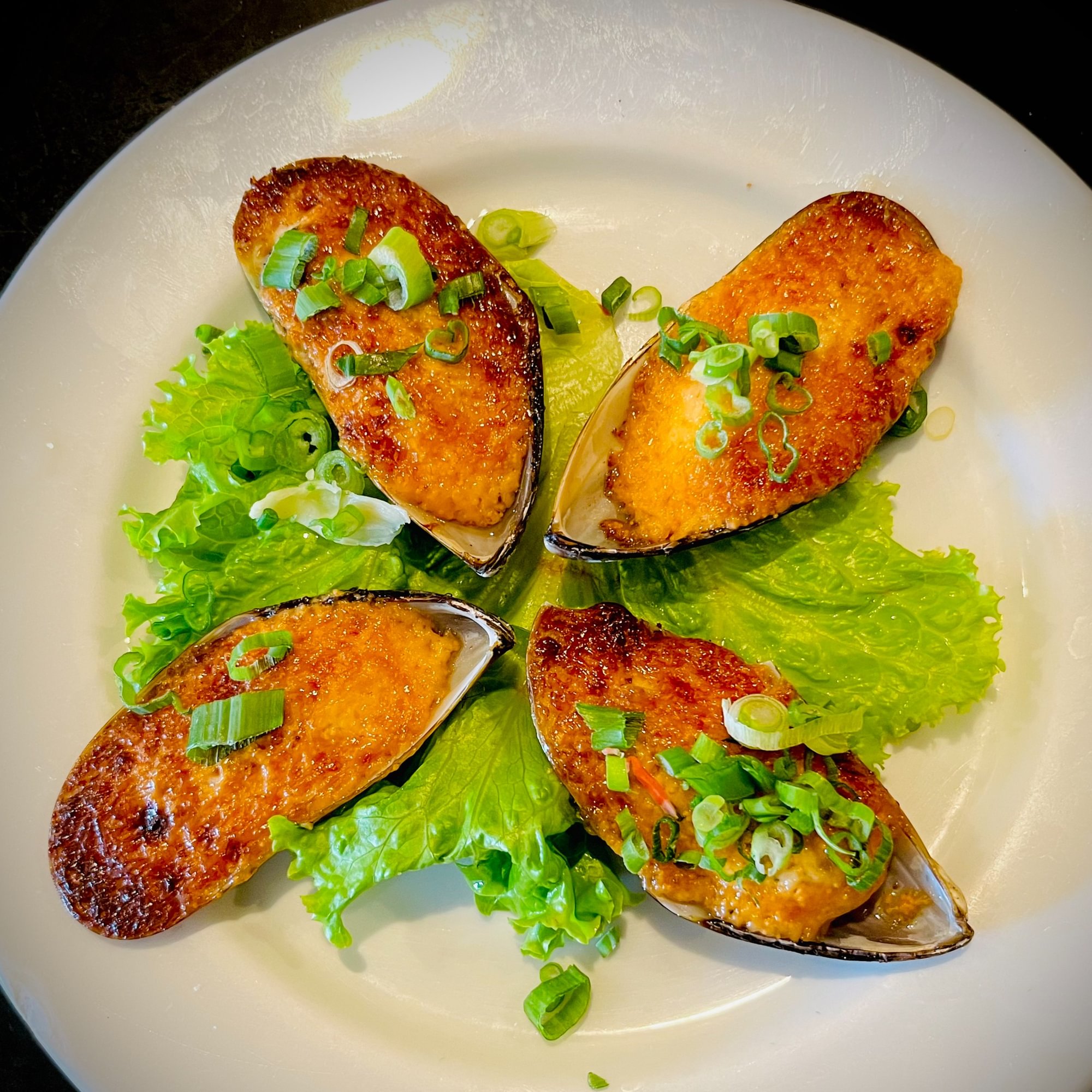 26. Spicy Baked Green Mussels
