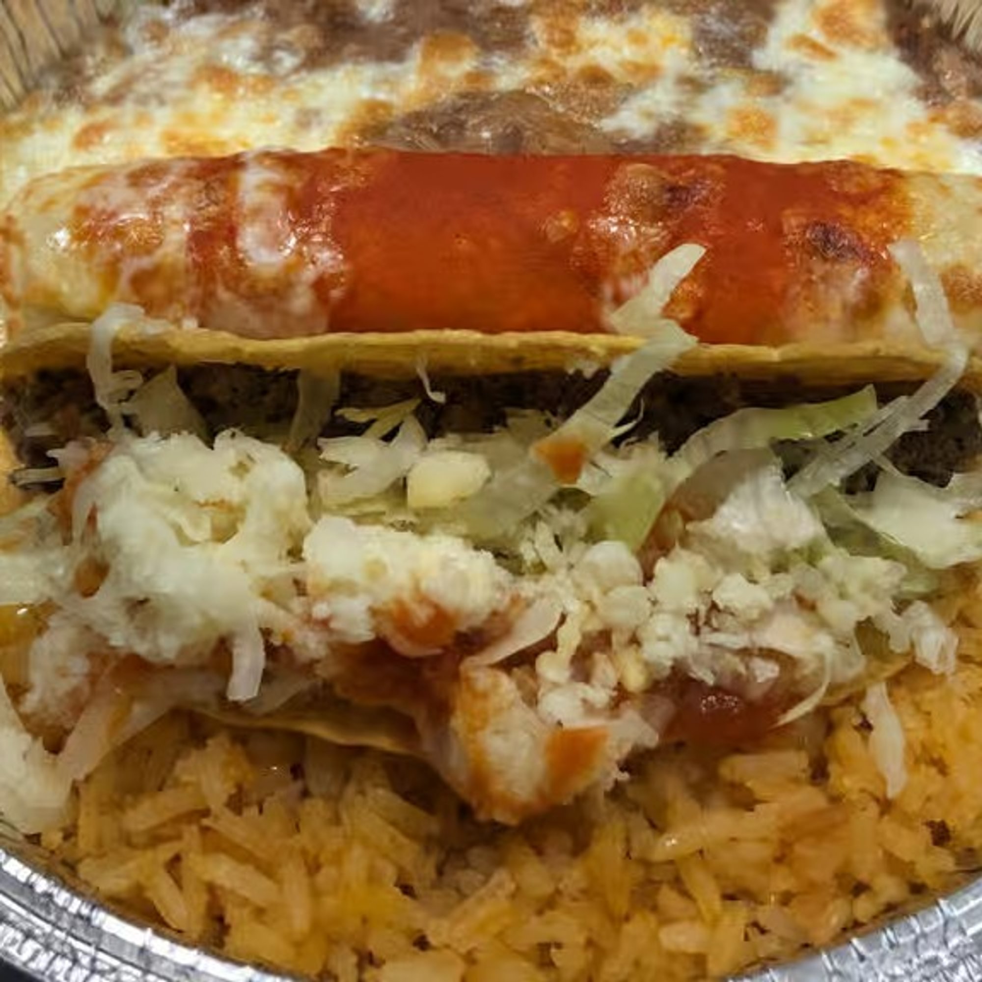 1. Enchilada y Taco Combo