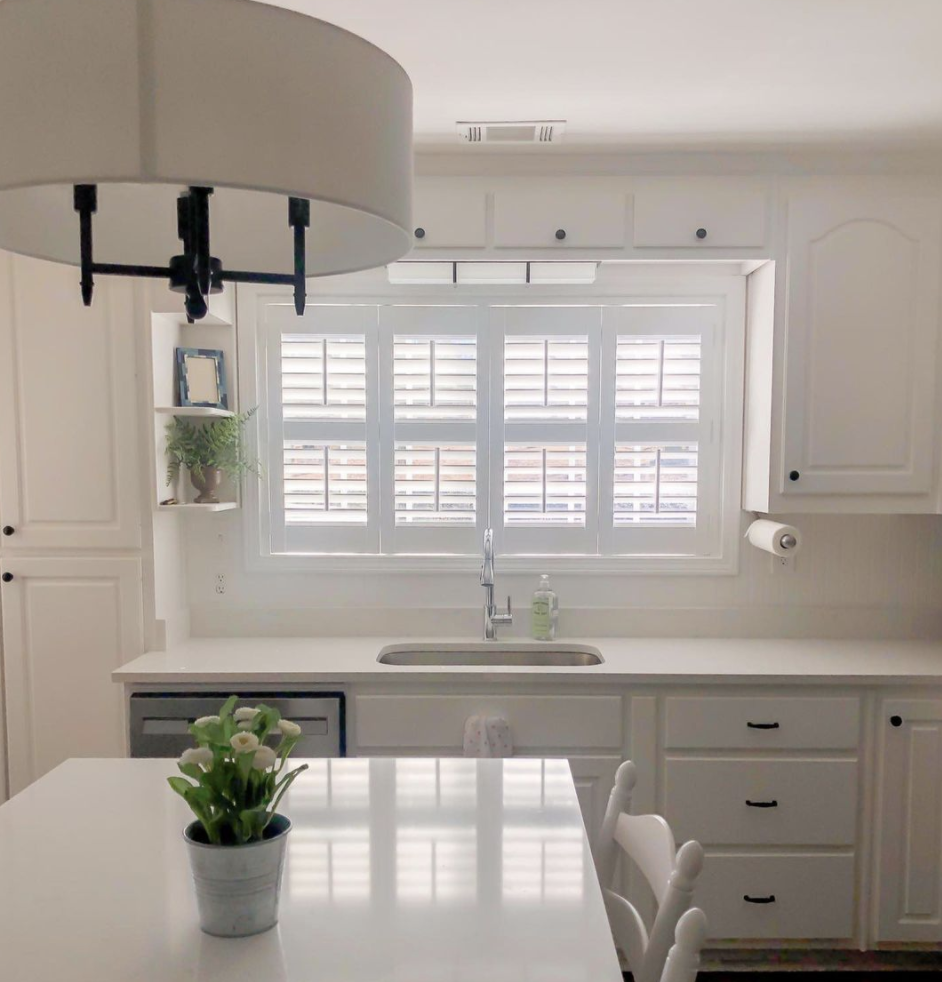 Beautiful white shutters can transform and brighten your kitchen!