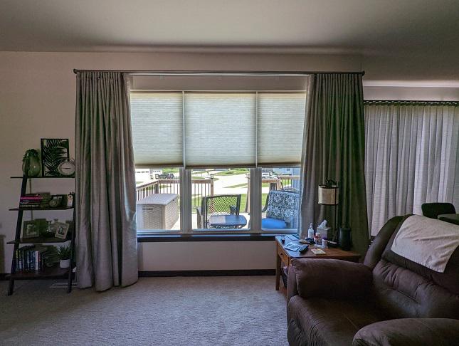 This is a combo that makes for a fresh, picturesque living room in this Cedar Falls home! We installed Cellular Shades plus these Custom Draperies to create a cohesive look!  BudgetBlindsCedarFallsWaterloo  CedarFallsIA  CellularShades  CustomDraperies  FreeConsultation  WindowWednesday