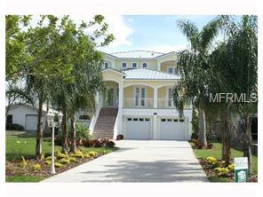 Recently Sold!!!! Ruskin Fl Water- 2008 PARADE OF HOMES WINNER! Custom built waterfront home with bay access and water views - quality 3 story block const. The private deck offers views of Tampa Bay and the back deck overlooks pool and canal with stairway to 2nd floor living area. Many more custom features included in this Key West style home. Oversized garage to fit 5 - 6 cars plus lots of storage space, driveway accented with pavers and inviting pool with deck of pavers. 