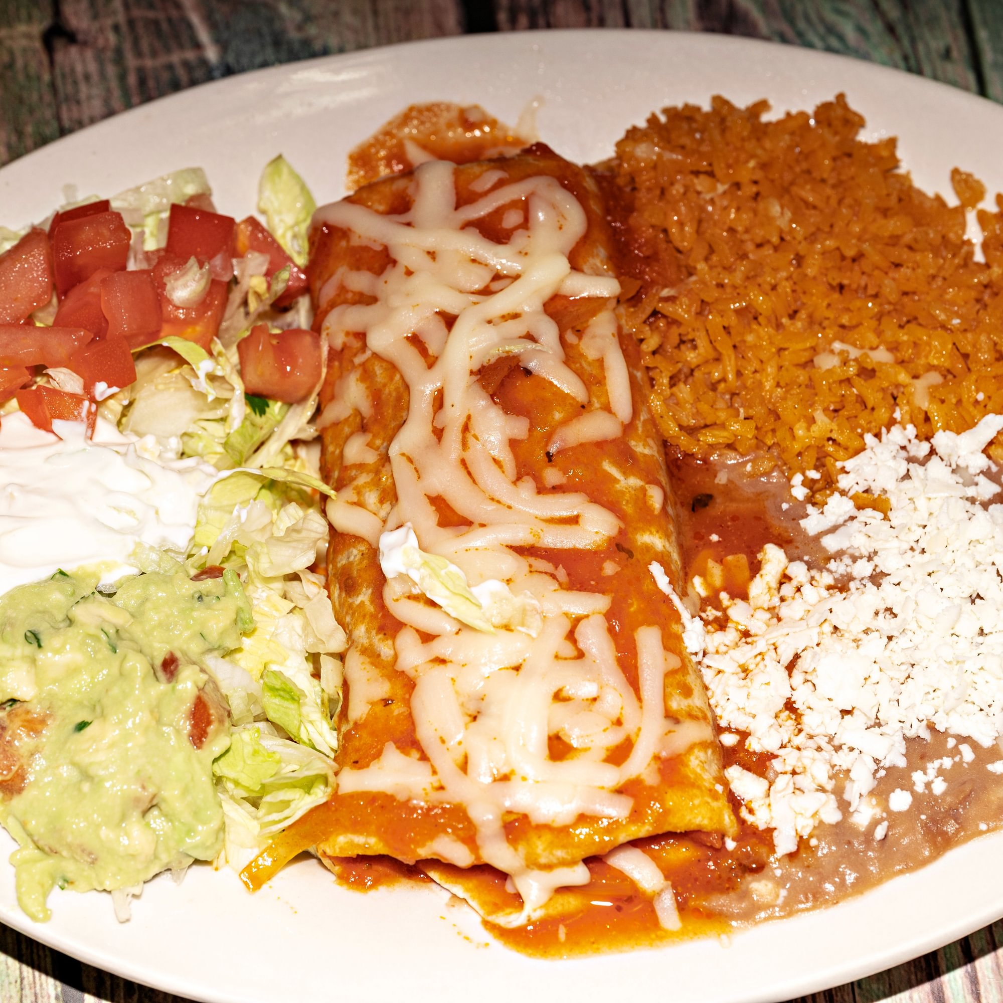 4 - Burrito covered with cheese dip
