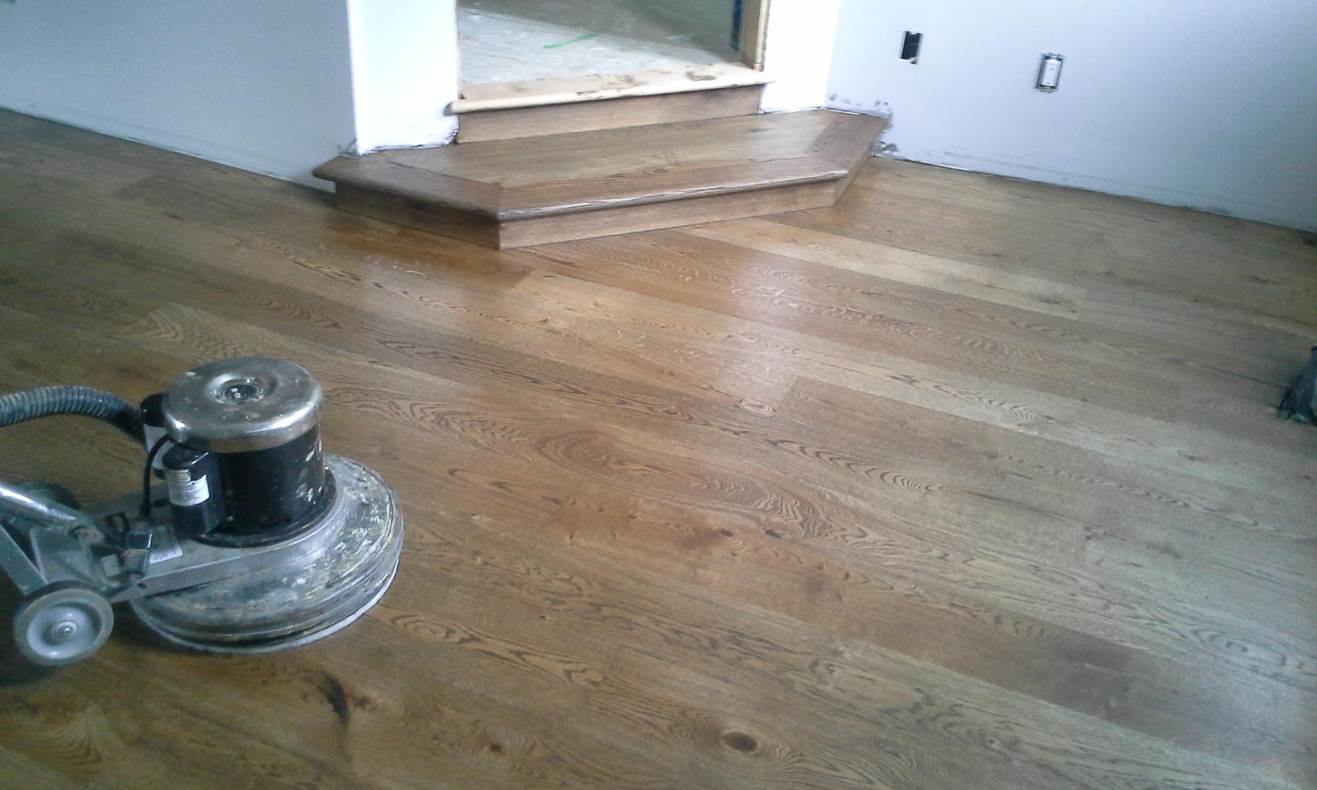 Custom cut and installed Rustic White-Oak step, tread, and risers finished w/ a black monocoat. Location: Colon Ave, S.F.