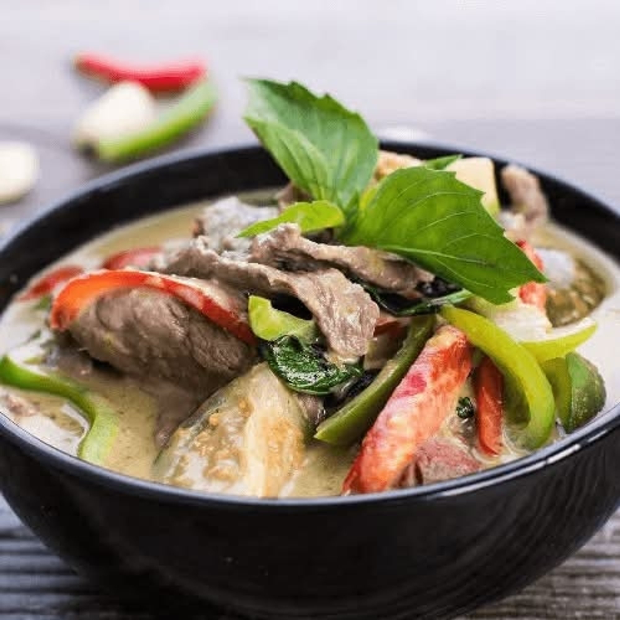 Cup of Green Curry Sauce