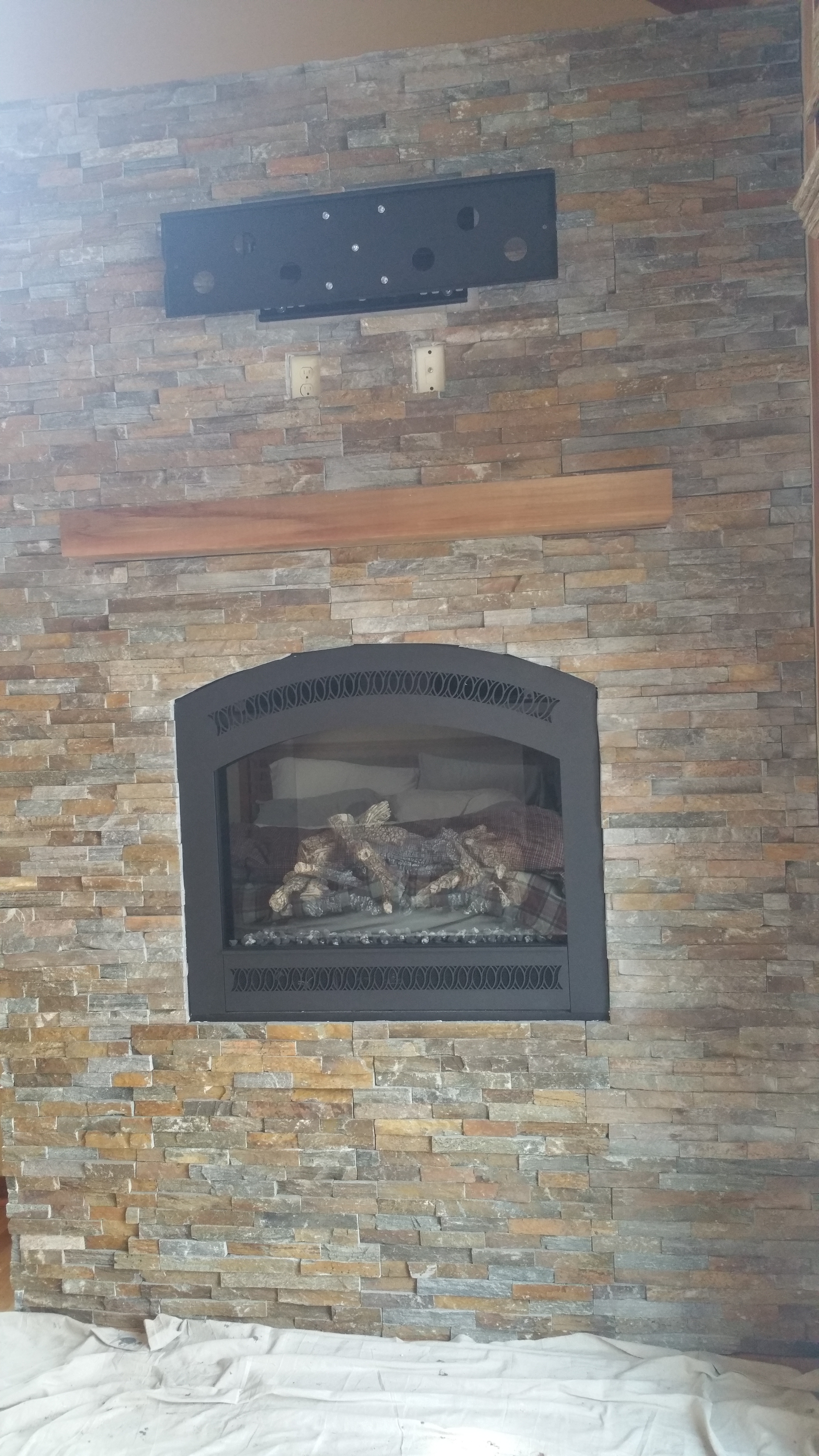 We worked with Duncans Fireplace and patio on the install of this fireplace and veneer stone.