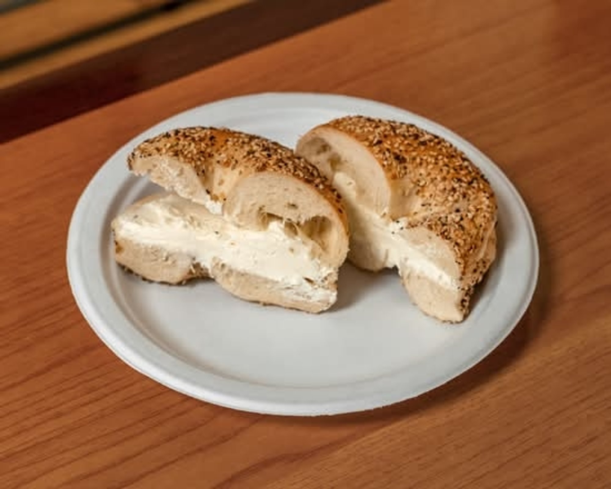 A bagel with featured cream cheese