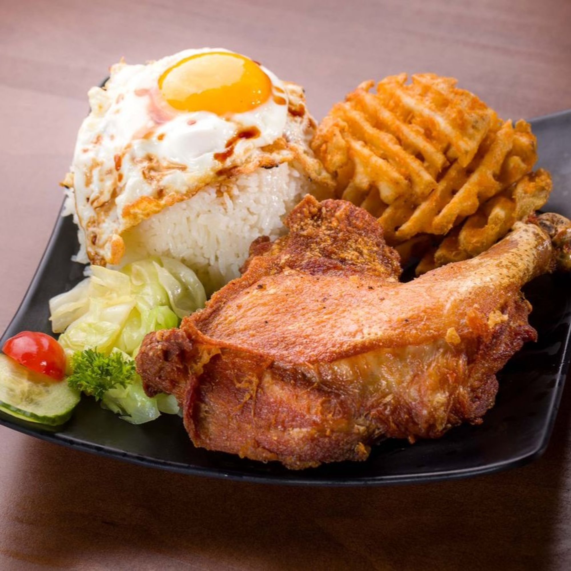 Fried Chicken Leg over Rice with Sunny Side up Egg
