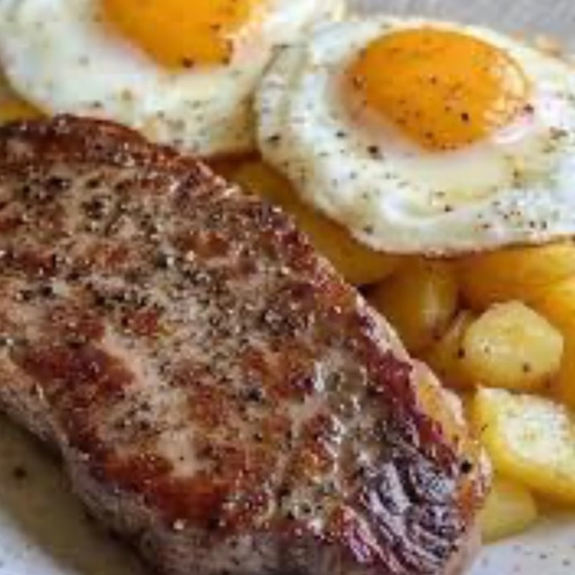 RIB EYE STEAK WITH TWO EGGS