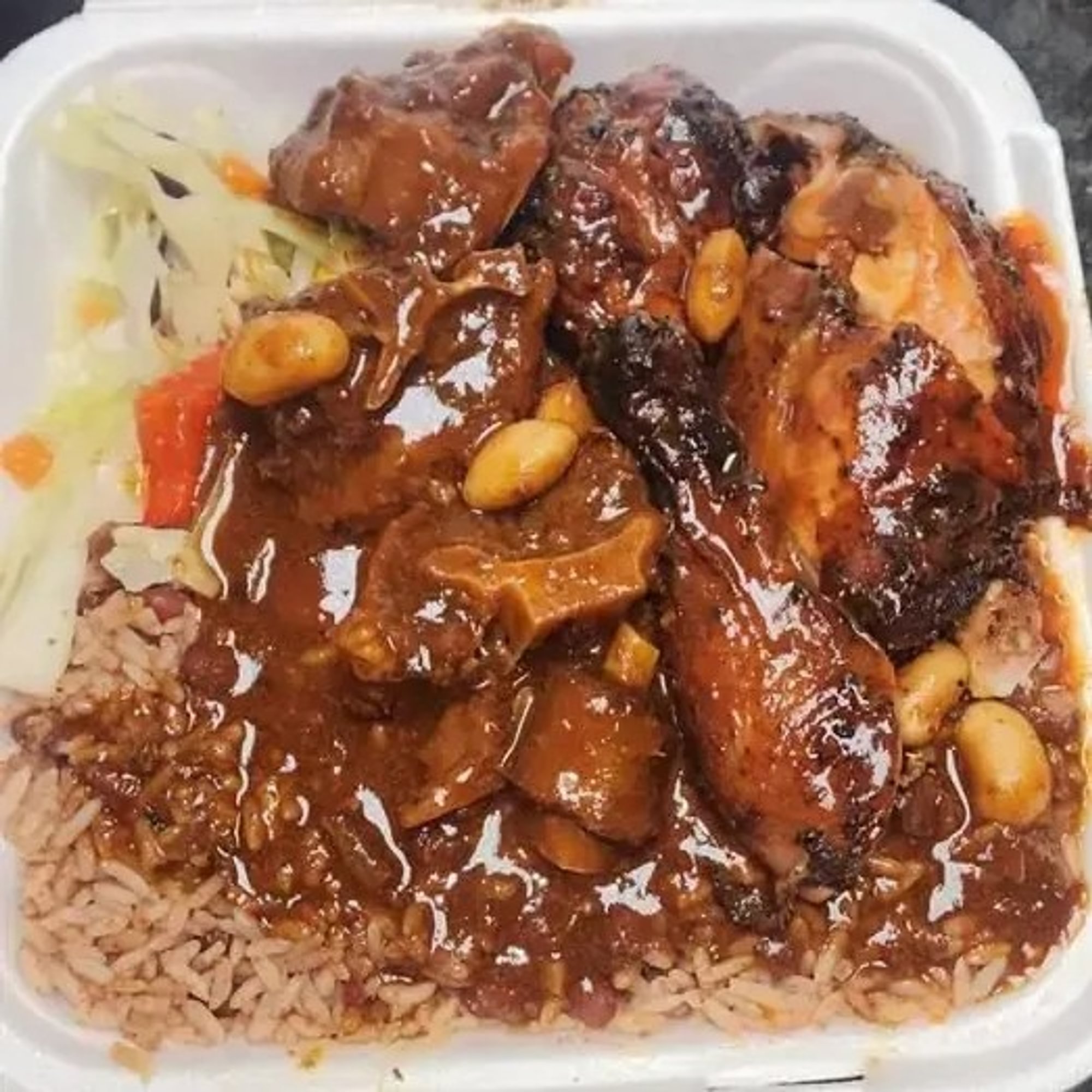 Oxtails & Jerk Chicken Combo