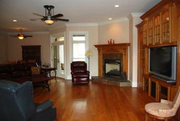 Our client recently purchased this home and decided to move the fireplace and take out the outdated cabinets.  