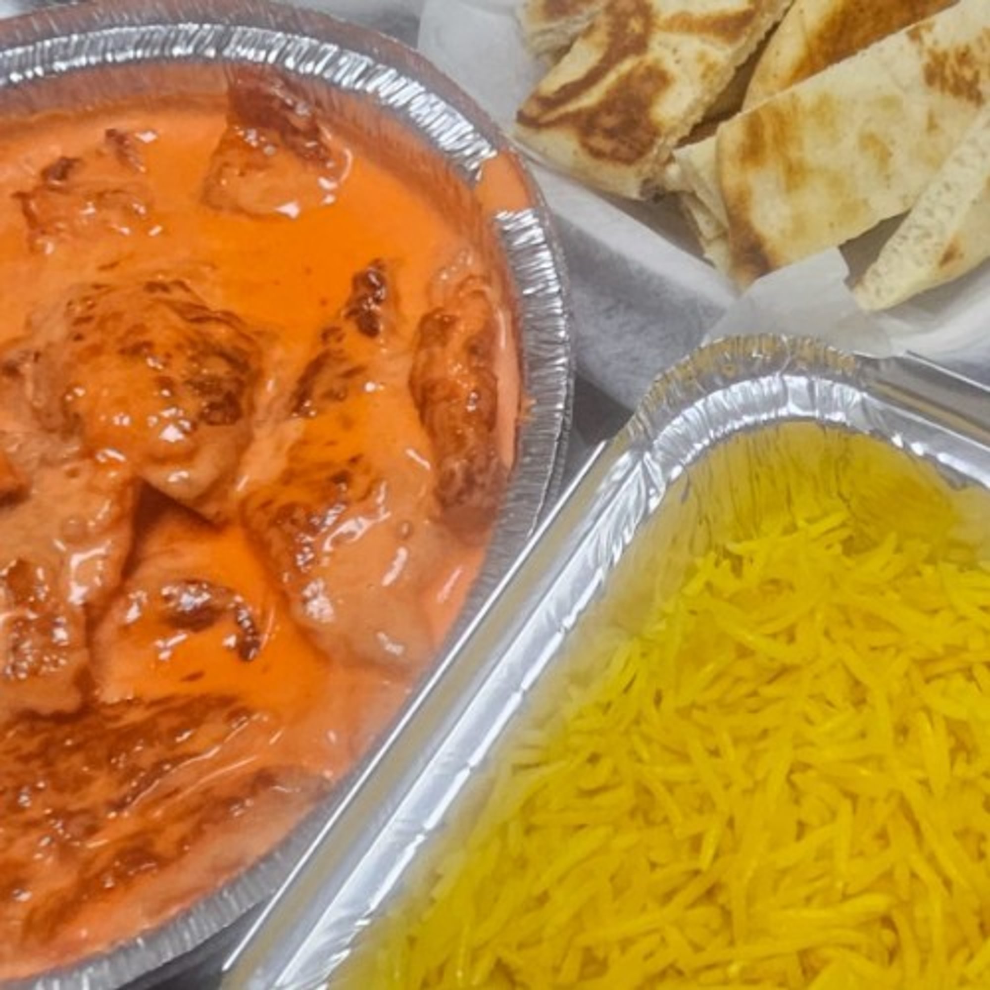 Butter Shrimp with Seasoned Yellow Rice & Pita