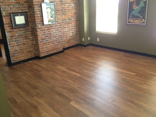 Vinyl Planks offer a wood-look for any home.  Benefit over wood?....Its water proof!  Great for homes with children and pets!