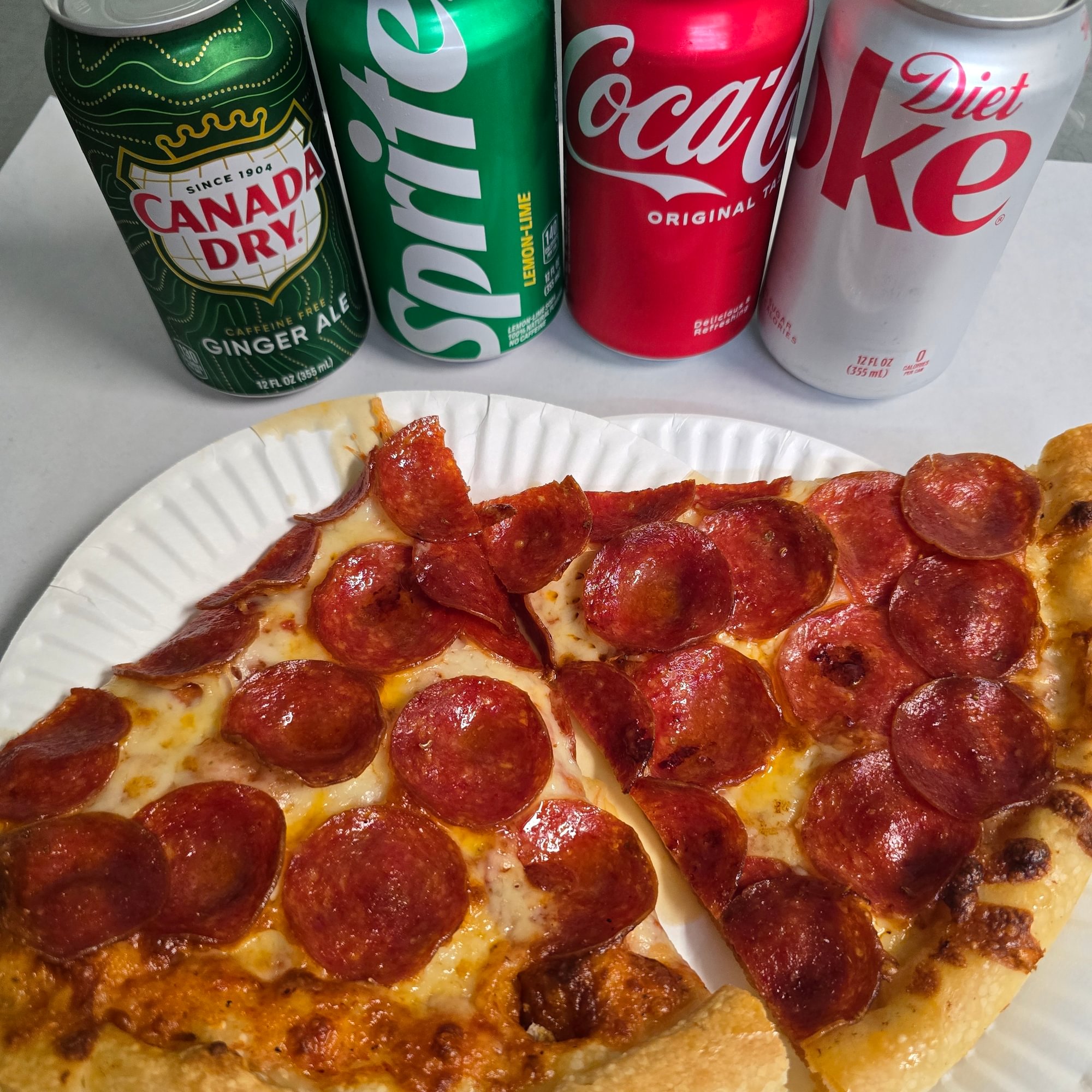 2 Slices of Pepperoni and a Can of Soda