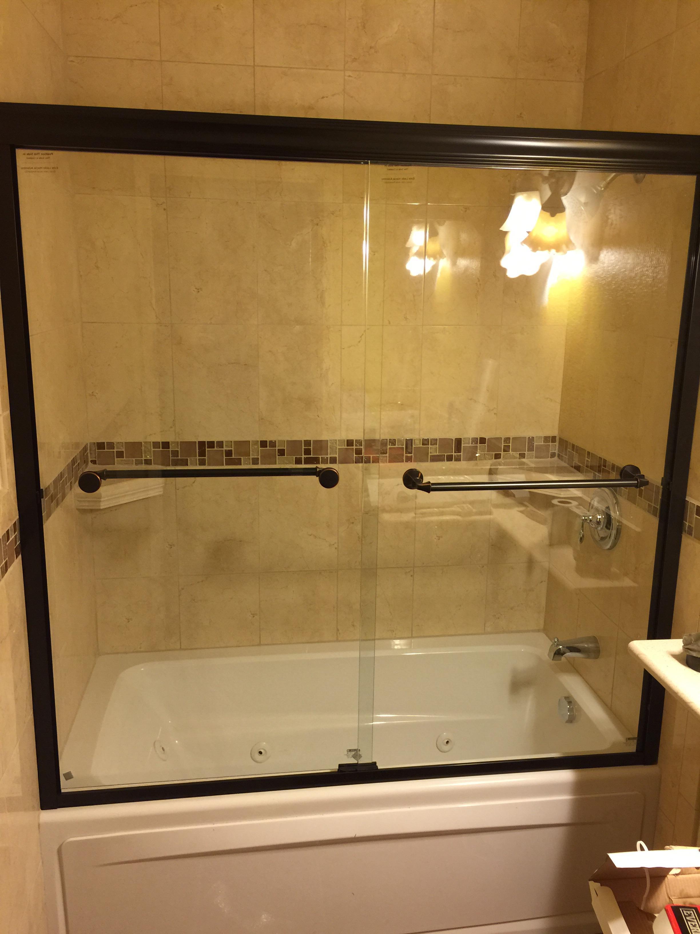Bath tub sliding glass doors installation