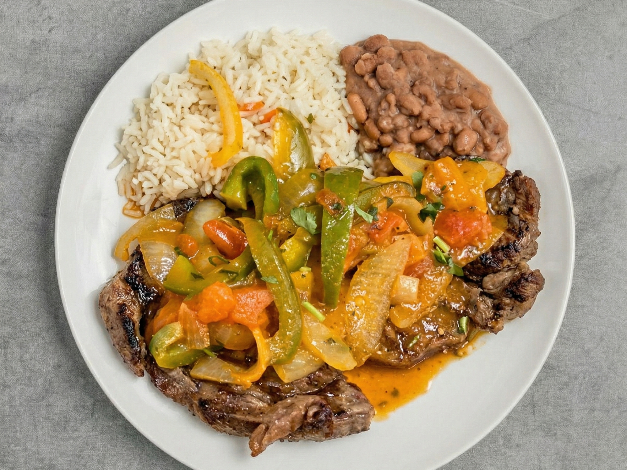 Bistec Encebollado