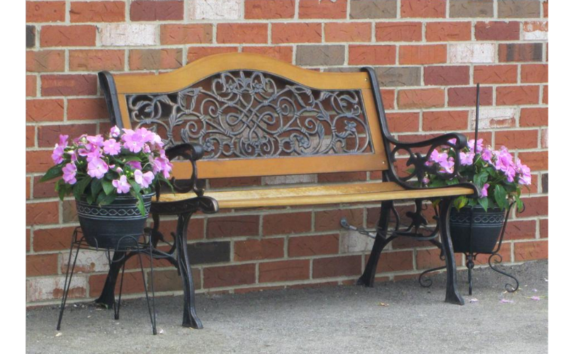 Bench in front of building for families and staff.