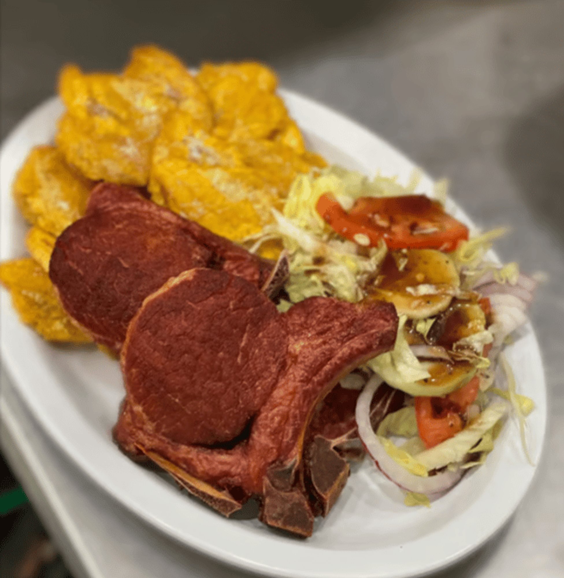 Chuleta Con Tostones