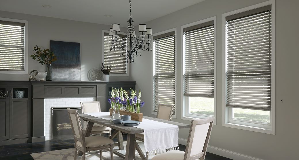 How gorgeous does this dining room look? The custom Wood Blinds add a wonderfully enchanting look to this room! We would love to be invited over for dinner at a place such as this!  BudgetBlindsOwasso
