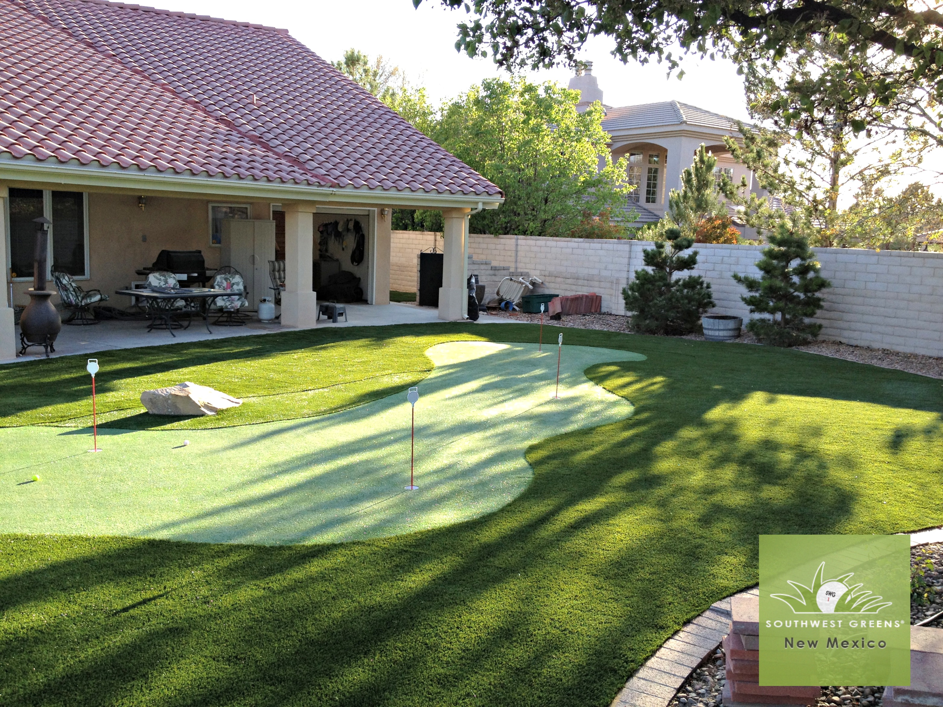 A backyard putting green can provide hours of entertainment or the perfect practice space for the serious golfer!