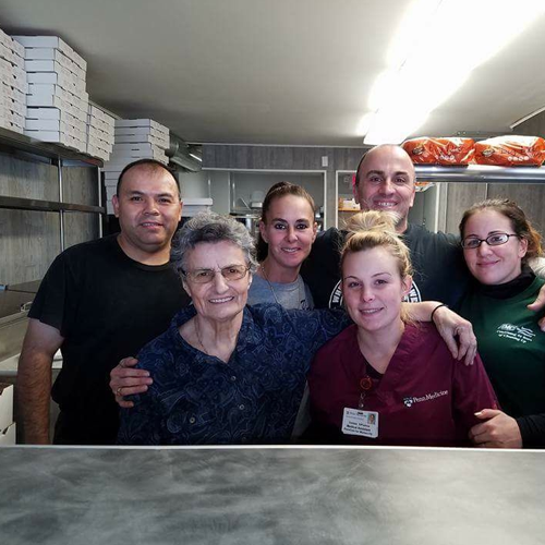 Dino's Style Pizza Logo