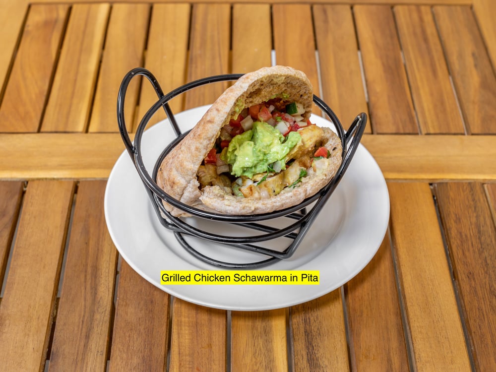 Grilled Chicken Shawarma Avocado Hummus, Israeli Salad, Tahini