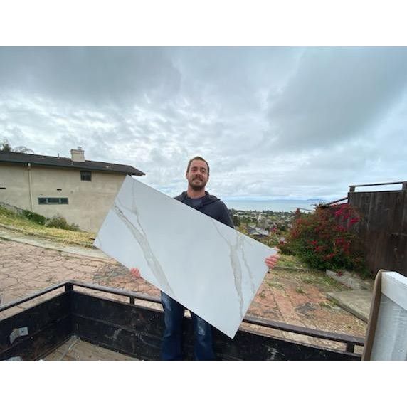 Elliot's Tile &amp; Handyman Service Logo