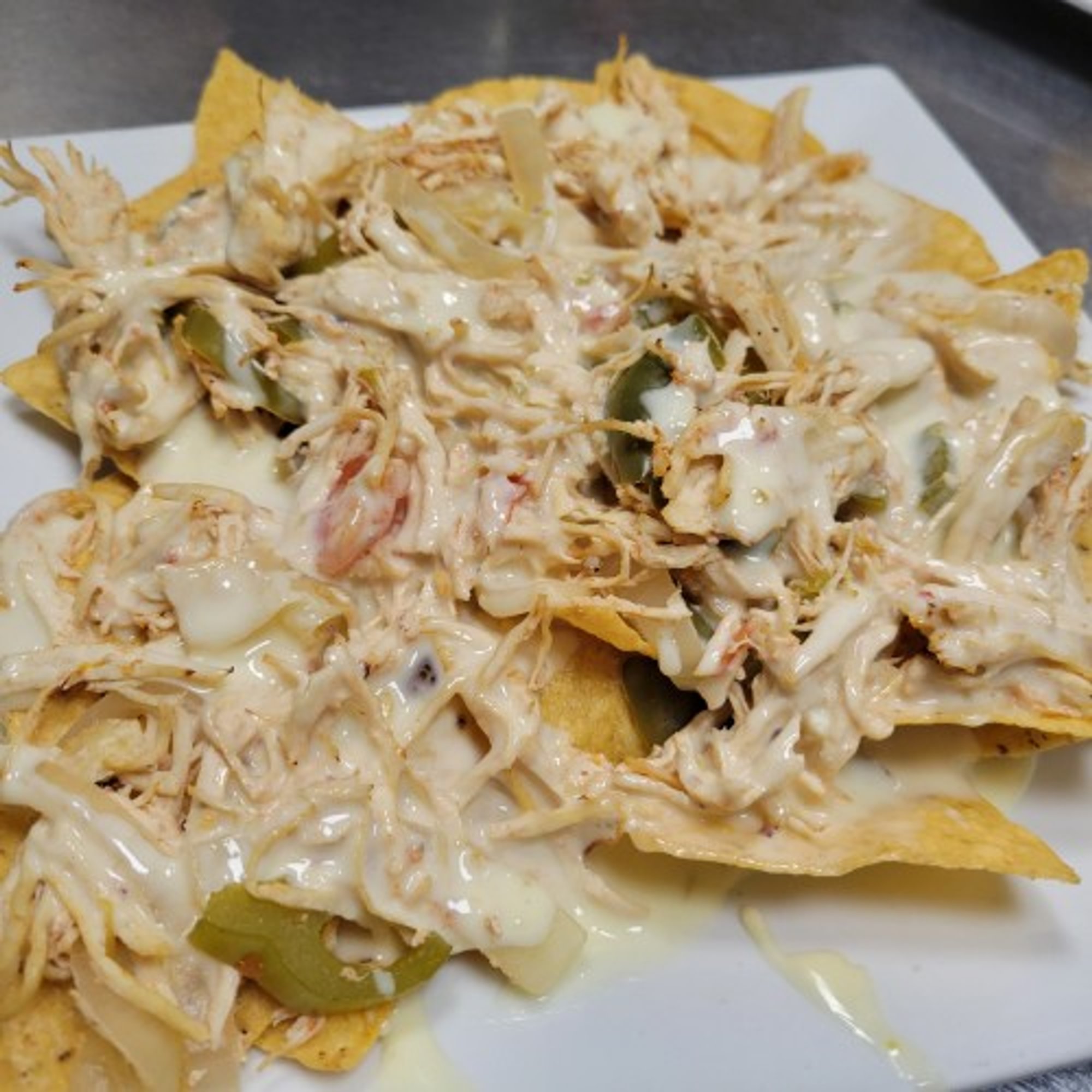 60. Chicken Nachos