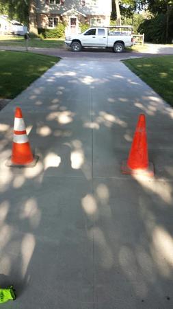 Brand new concrete driveway. Brand new concrete driveway.