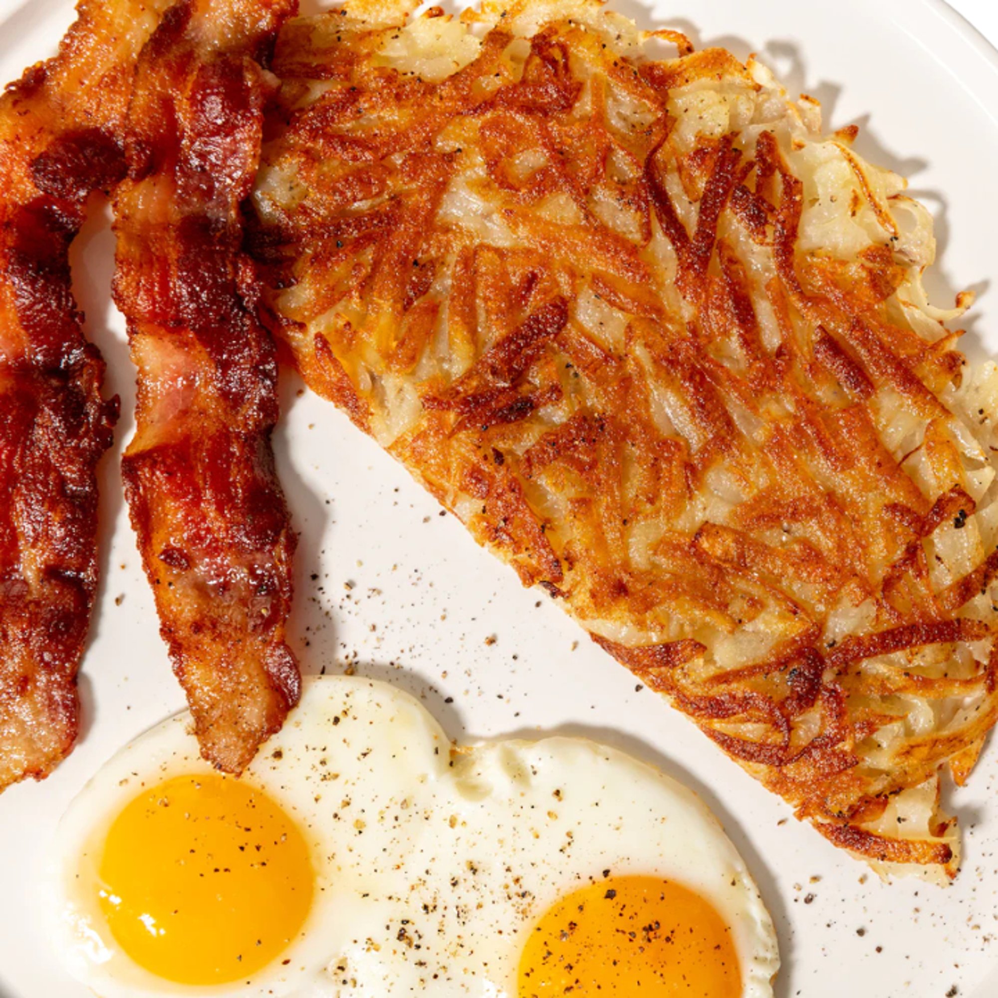 2 Eggs Any Style W/Bacon Box