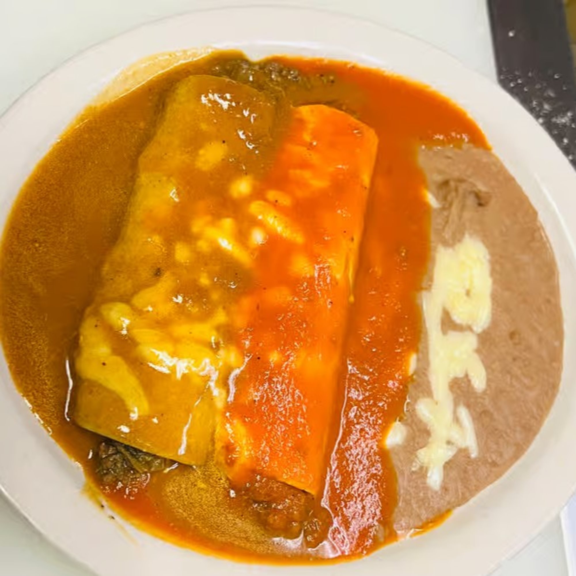 3 Enchilada, Burrito & Rice or Beans