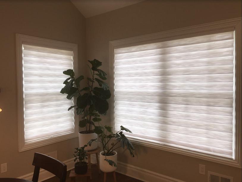 Check it out-this space features our Hunter Douglas Vignettes! They have such smooth, clean lines, and they're ideal for filtering light to keep your spaces nice and shady.