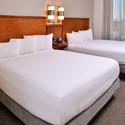 Rooms should always feel, well, roomy and we made no exception here with separate sleeping and living areas, including two queen Hyatt Grand BedsÂ® and our Cozy Corner with sofa sleeper, perfect to sit back and relax.