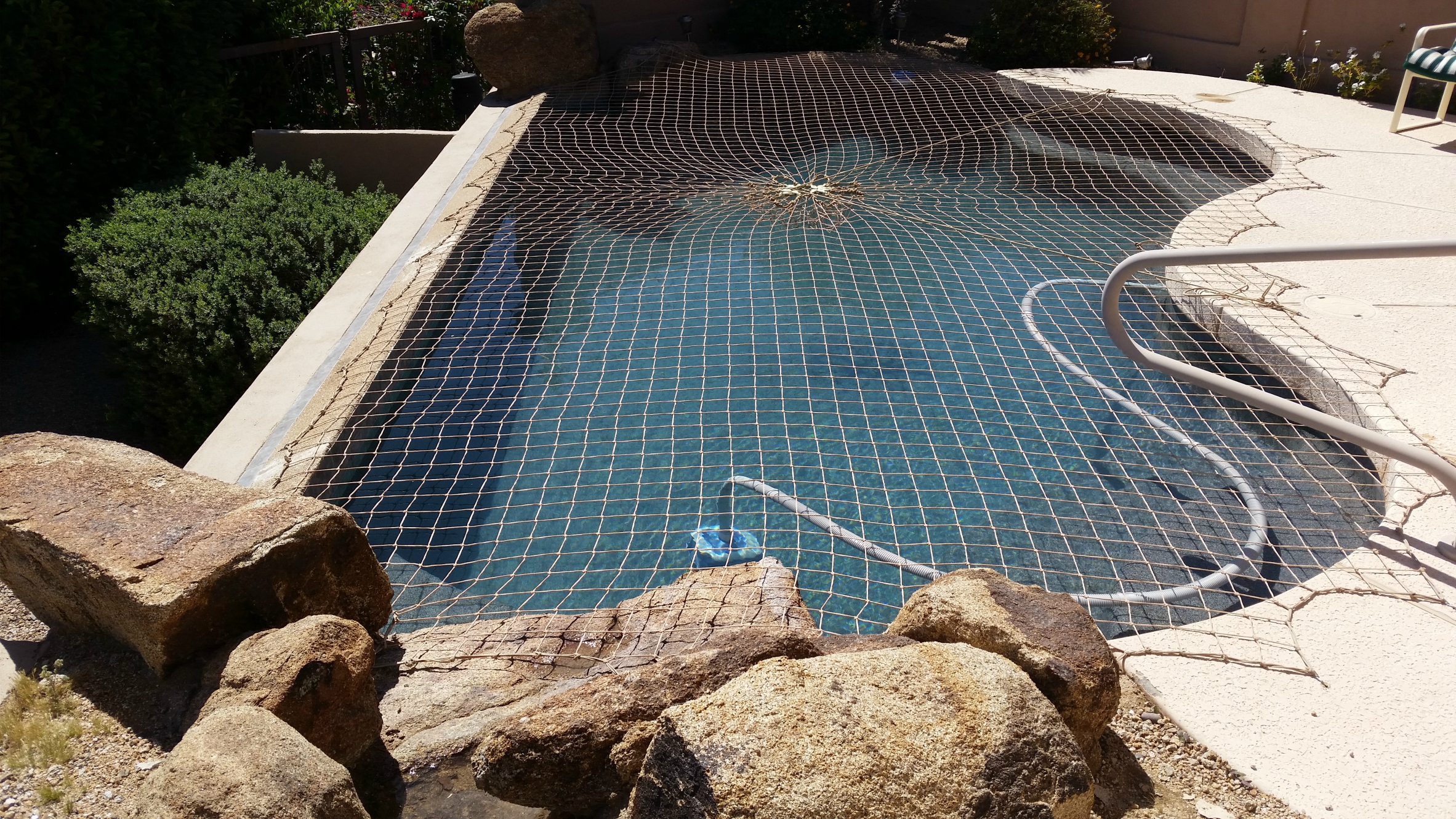 Katchakid pool safety net in Desert Sand.