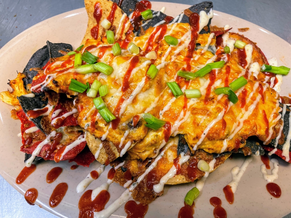 Buffalo Chicken Dip Smothered Nachos