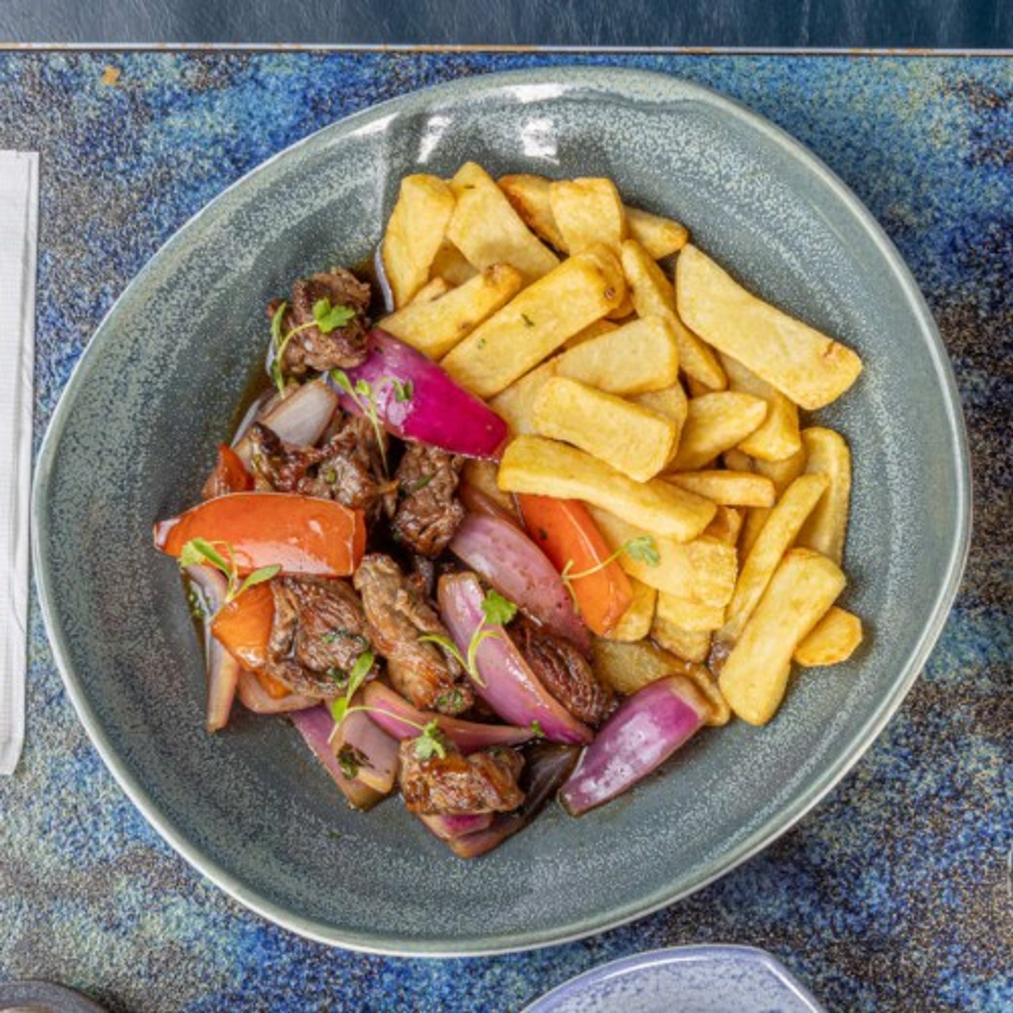 Lomo Saltado Flambeado