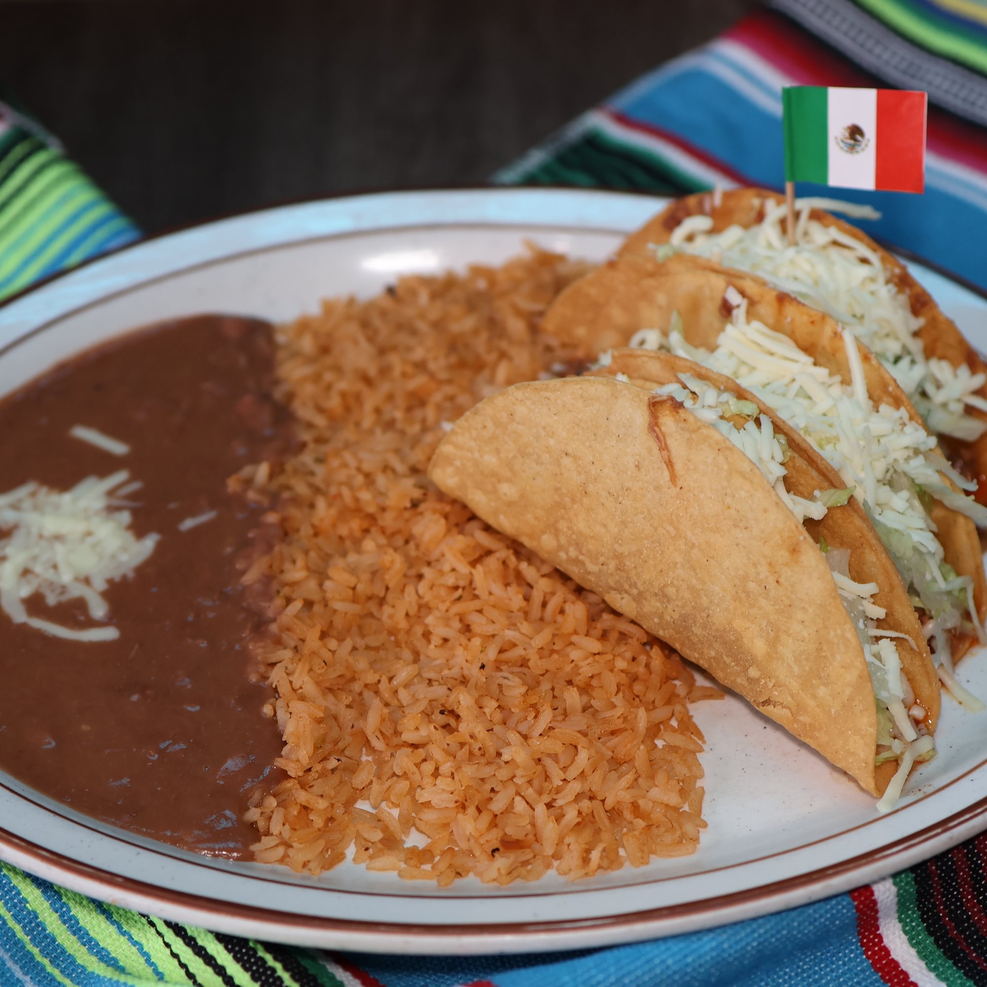 10. Three Beef Tacos, Rice & Beans