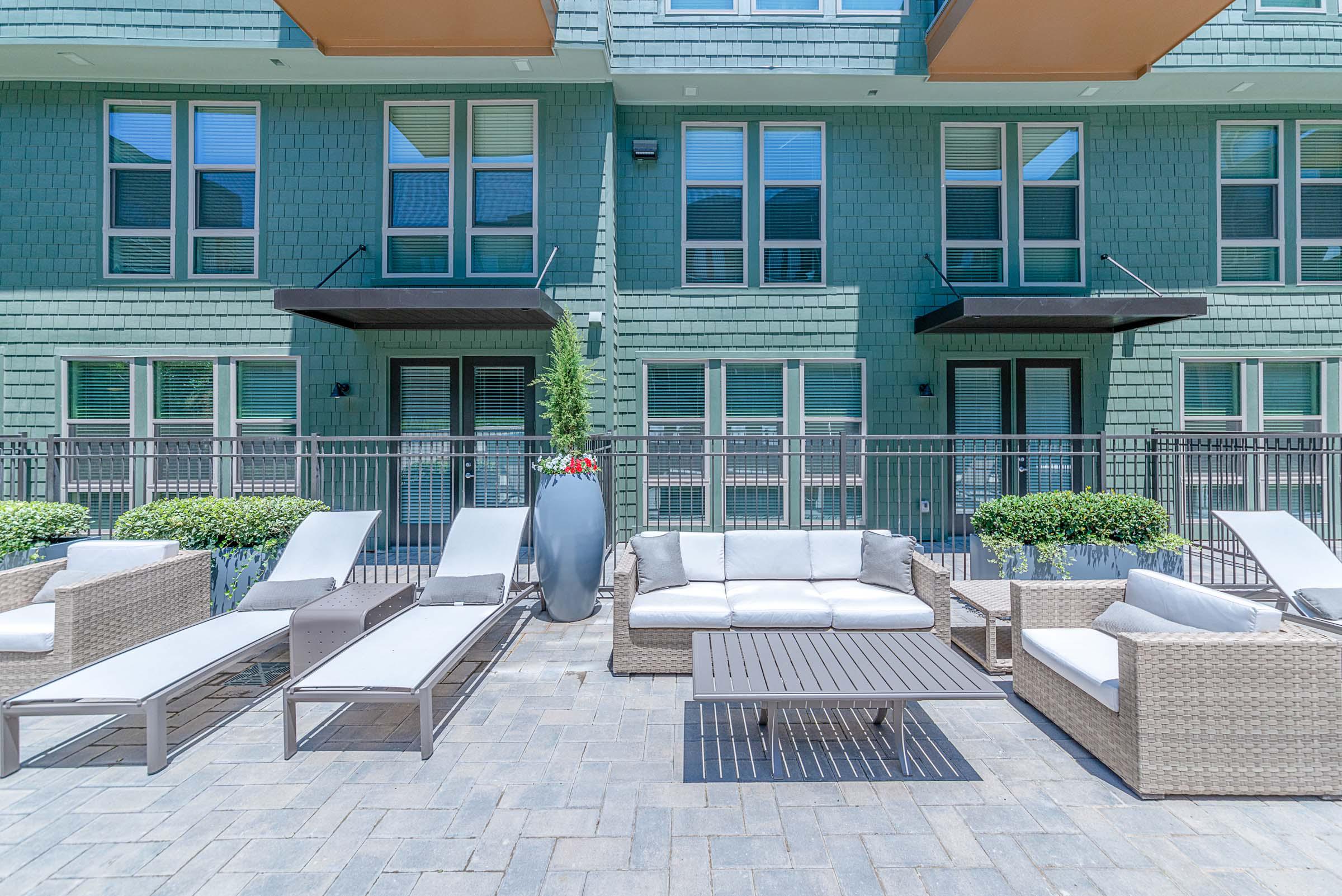 Flats side pool deck with lounge seating