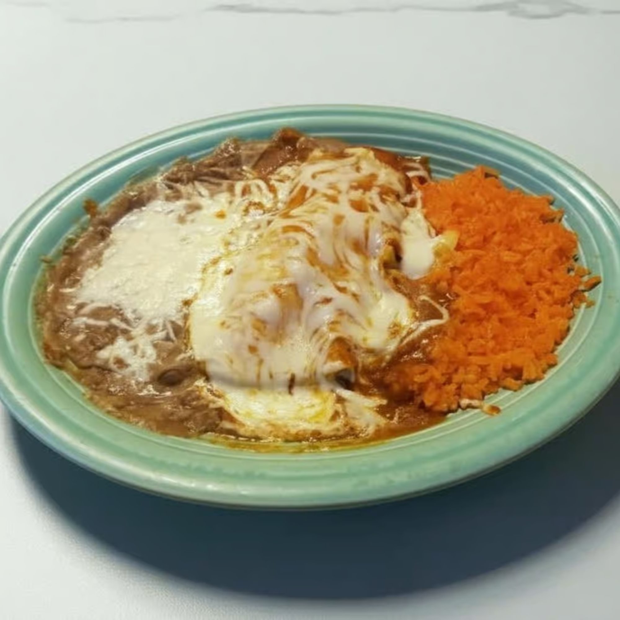 Burrito with Beef Tips, Chicken Enchilada and Special Tostaguac