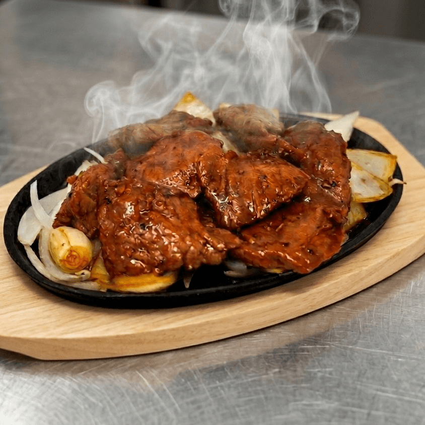 Sizzling Baby Cow Rib with Black Pepper Sauce