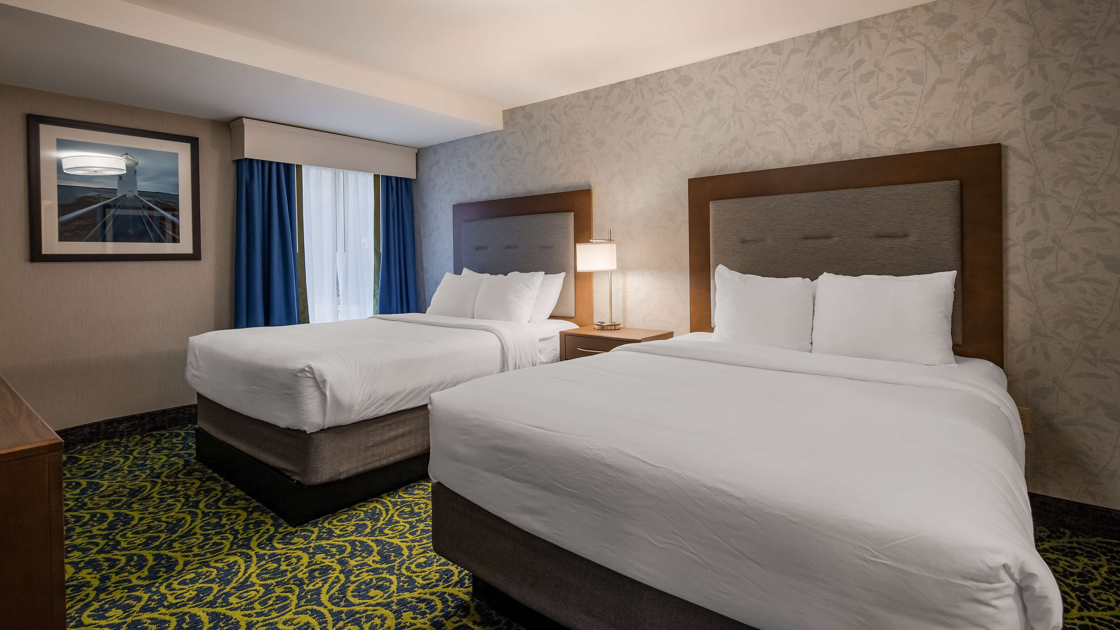 Guest room suite with two queen beds