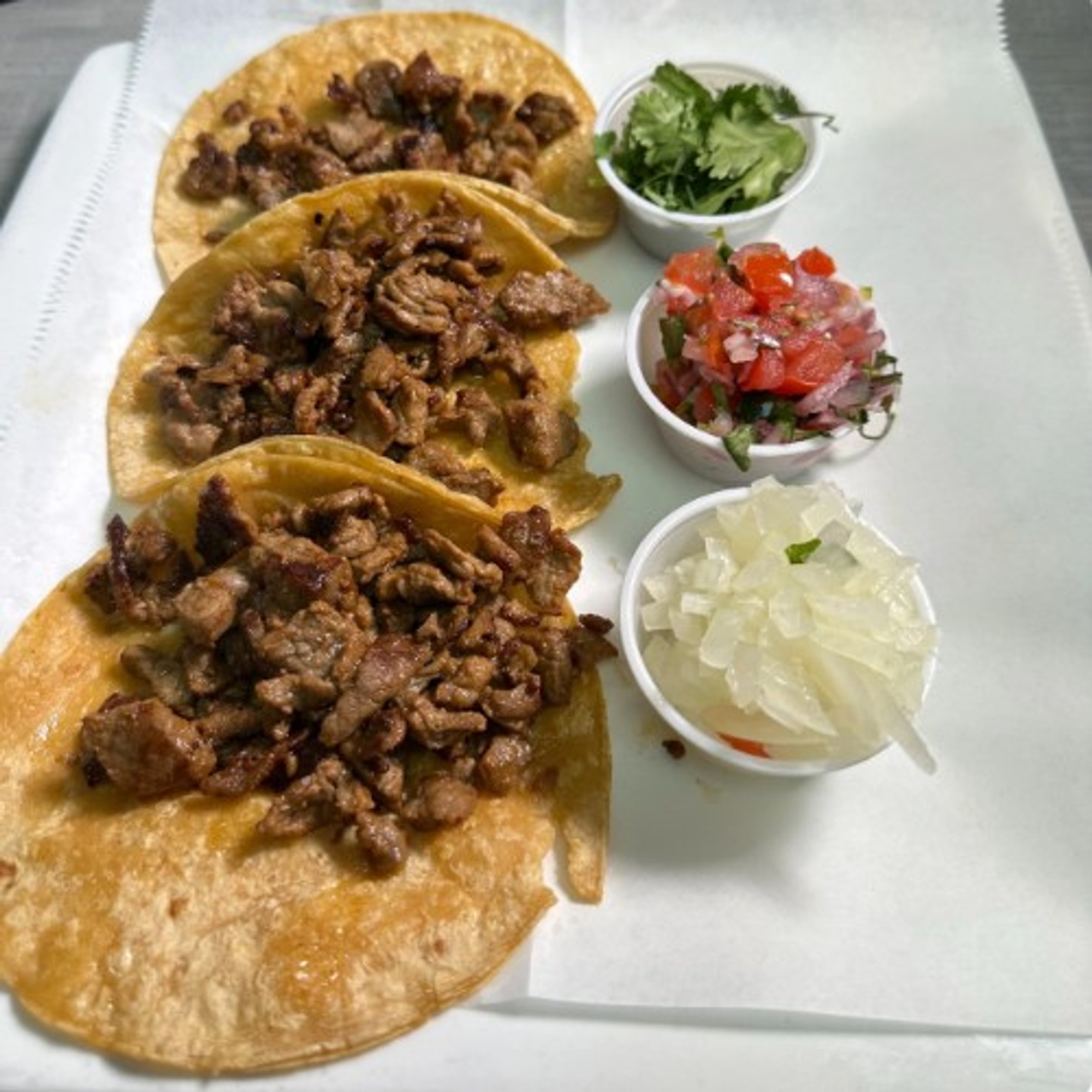 Tacos De Carne Asada or Chicken Y Carnitas