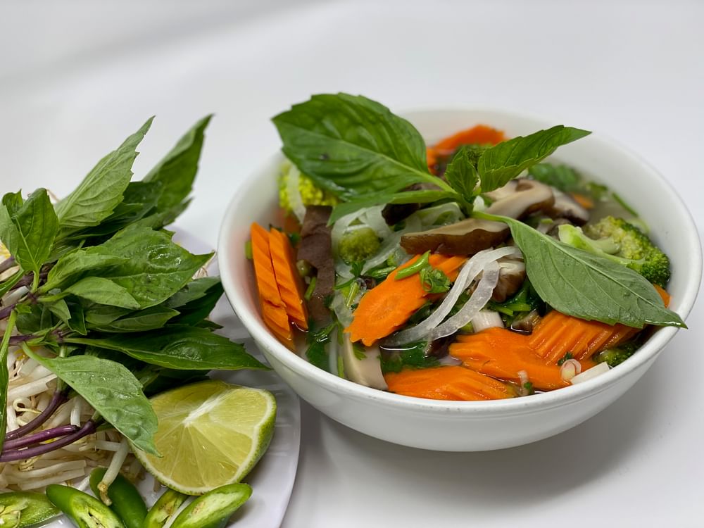 16. Steamed Vegetables, Mushrooms, Fried Tofu and Rice Noodle Soup