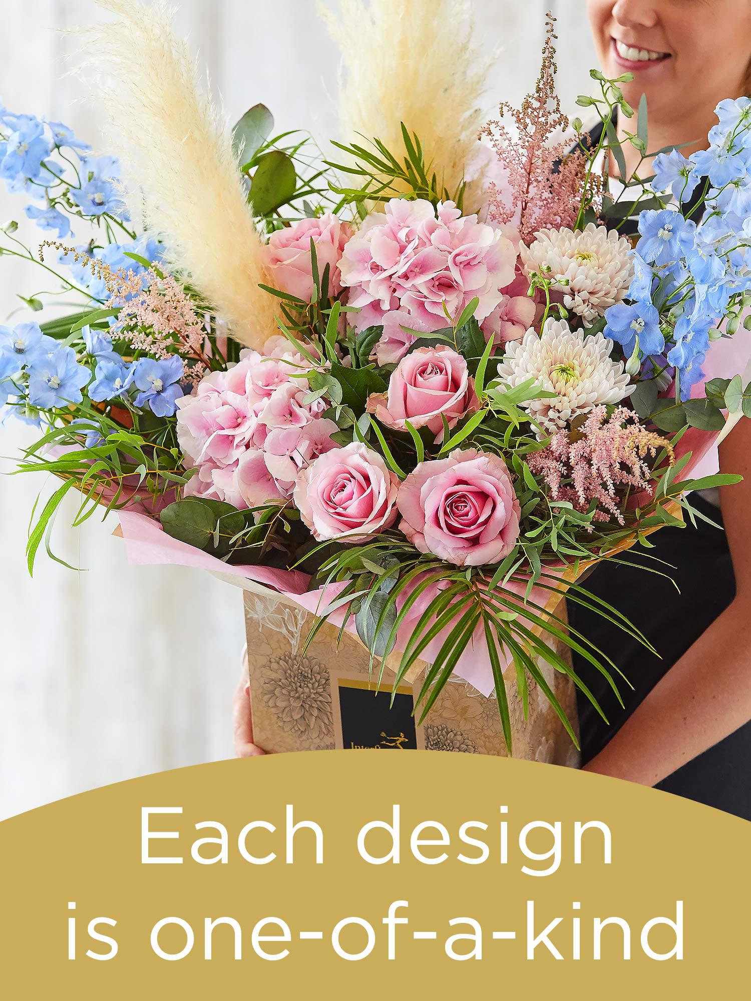 Hand-tied bouquet made with seasonal flowers