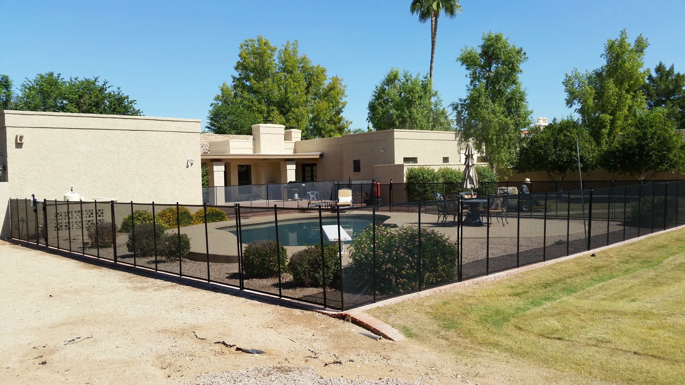 Katchakid's removable aluminum pool safety fence.