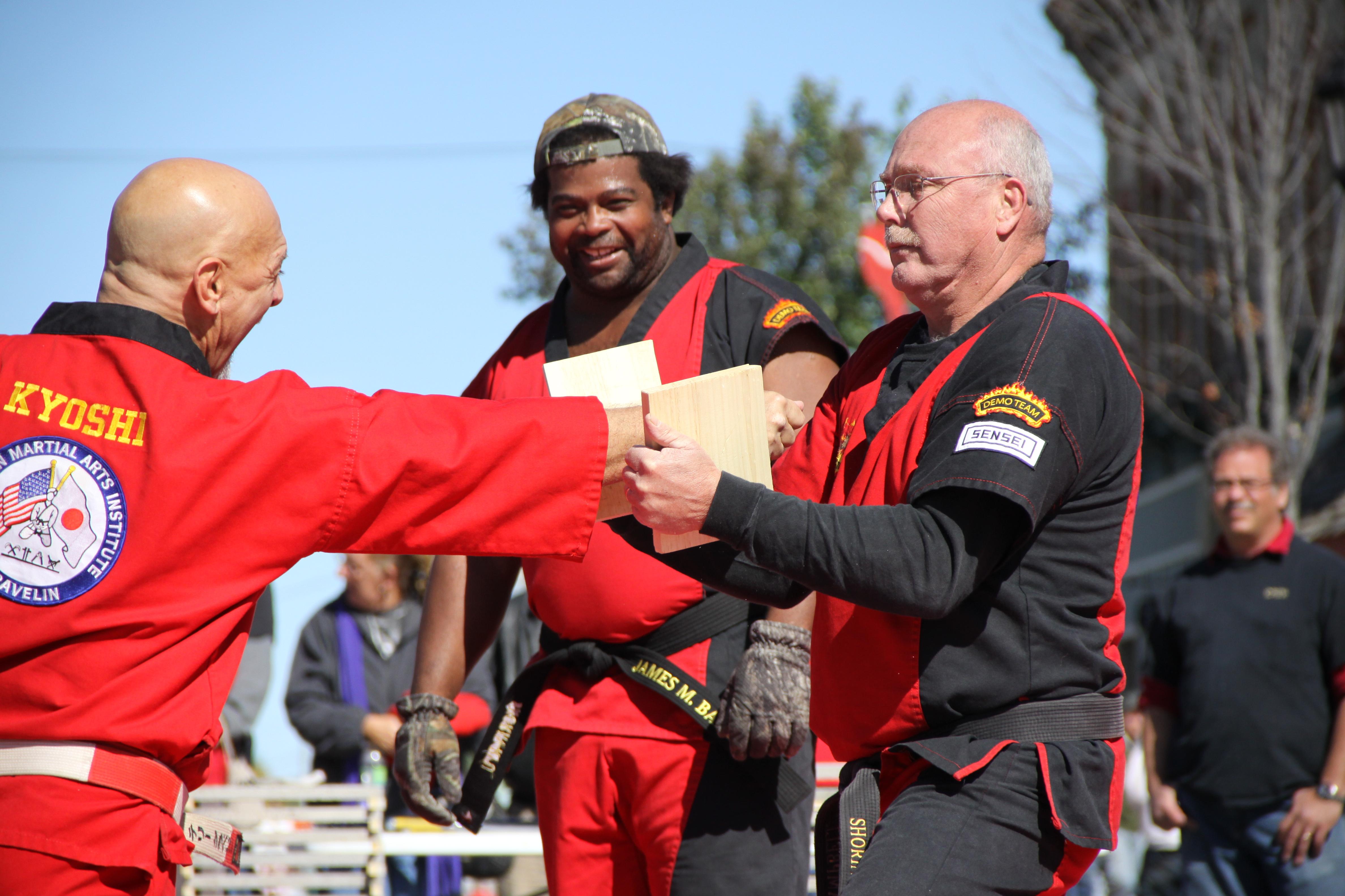 Kyoshi Gravelin breaks a board with his thumb...