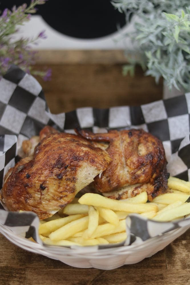 1/2 Rotisserie Chicken +2 Sides + 4 Sauce