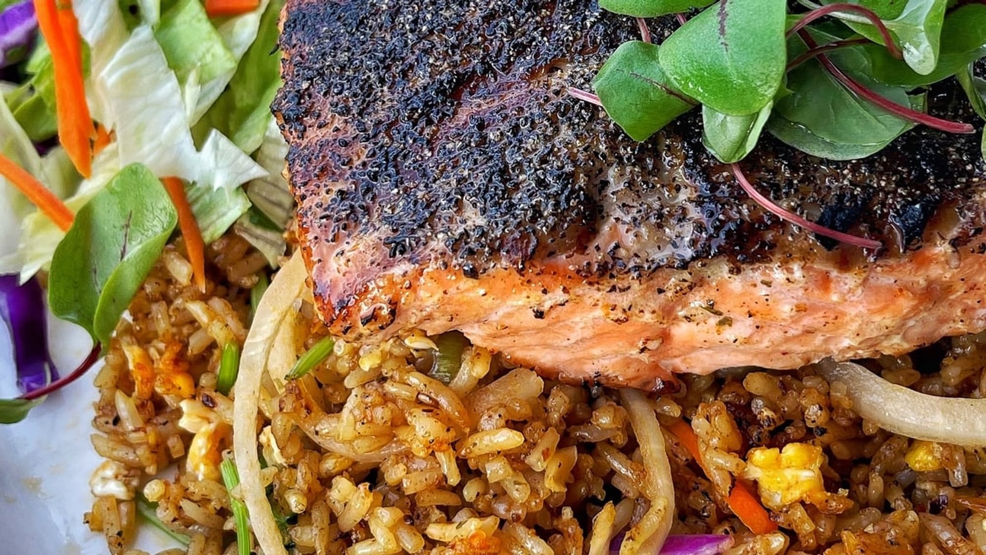39. Blackened Salmon on Cajun Fried Rice