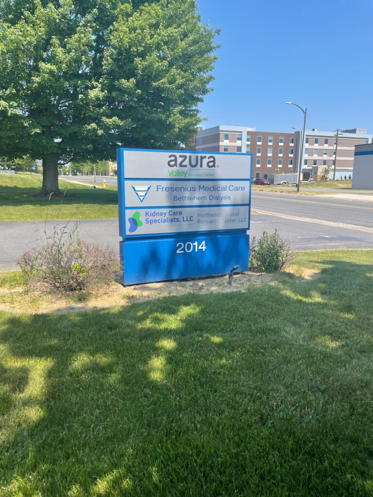 An outdoor sign for Valley Access Center