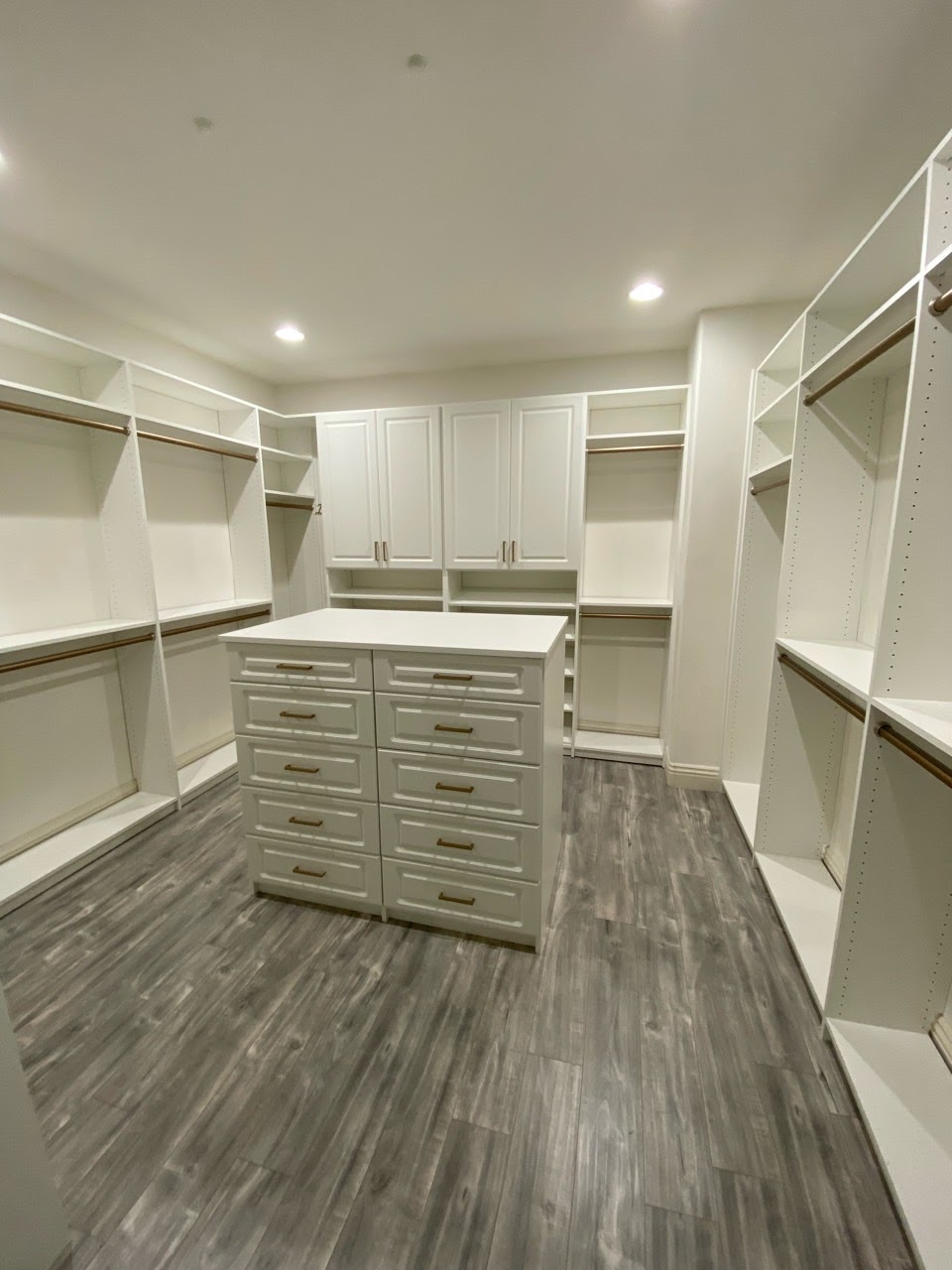 White Walk-in closet w/ island