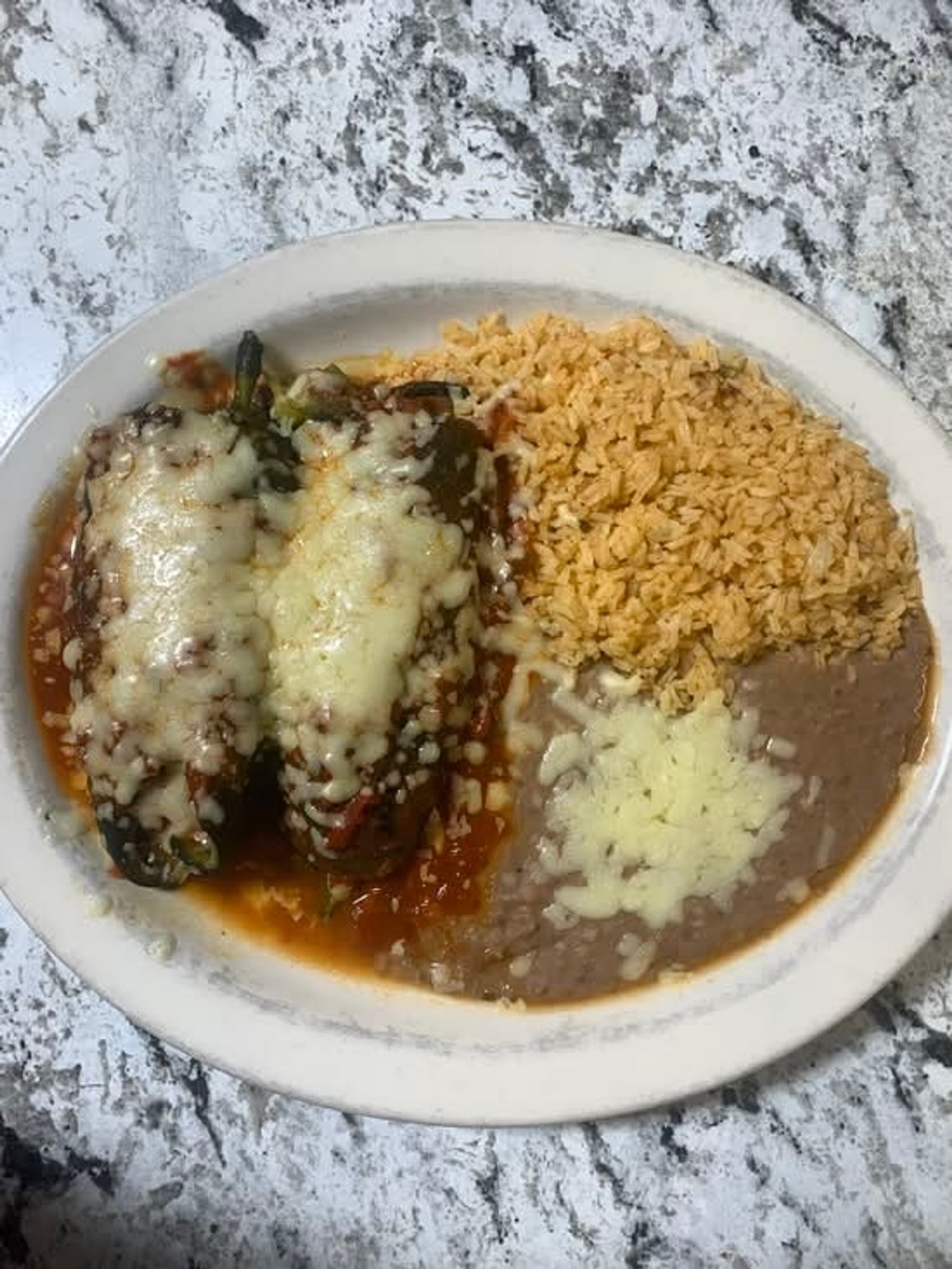 #13-Two Chiles Rellenos, Rice and Beans with Melted Cheese